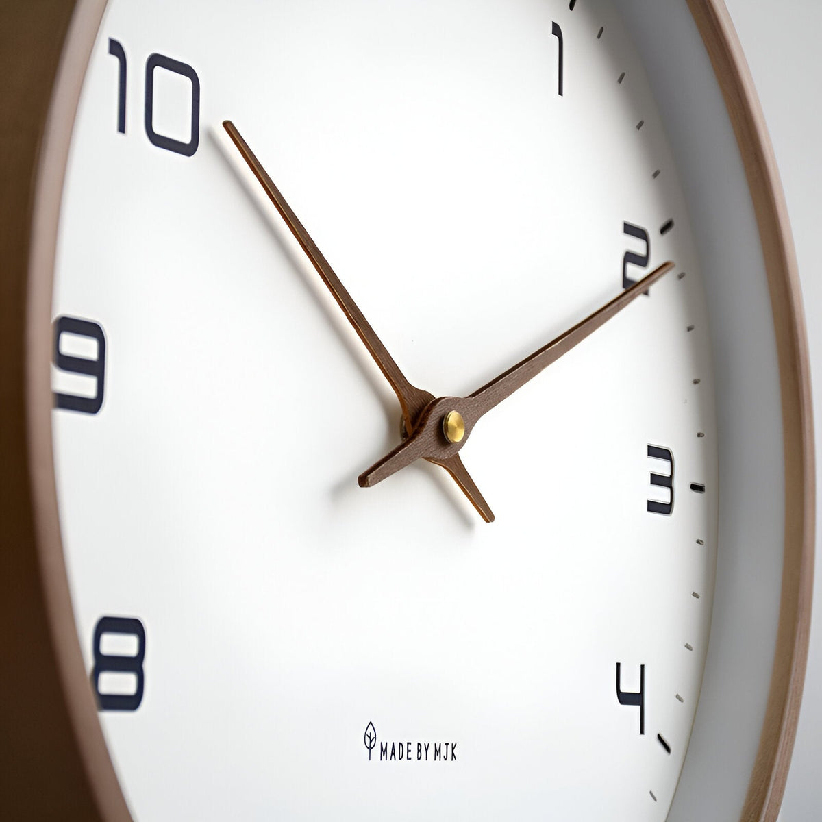 Wood frame wall clock, face detail
