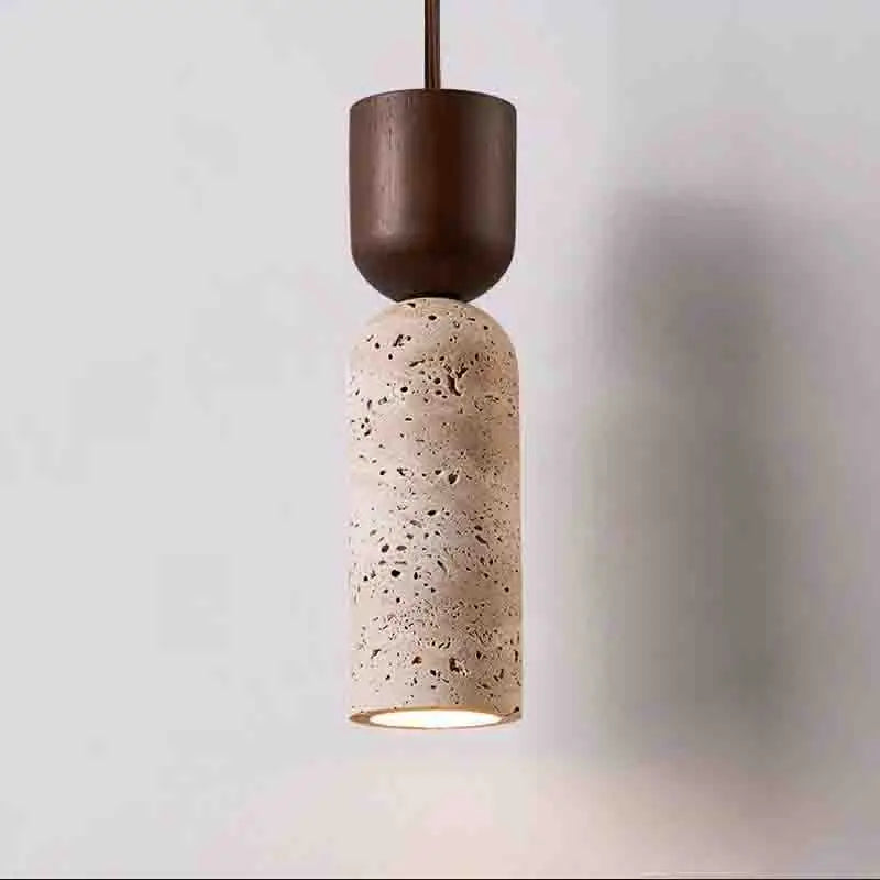 Stone-look bottle-shaped pendant light with a dark wood cap, lit