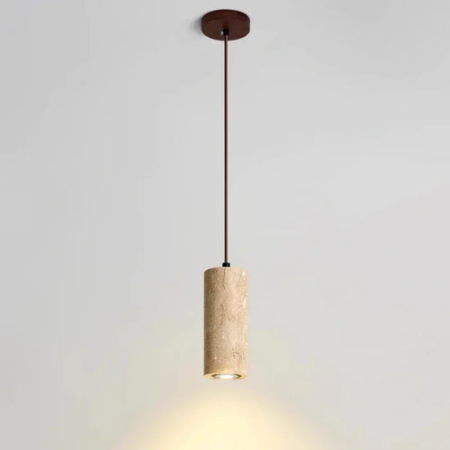 Marble cylinder pendant light with a brown cord and round ceiling plate casting light downward
